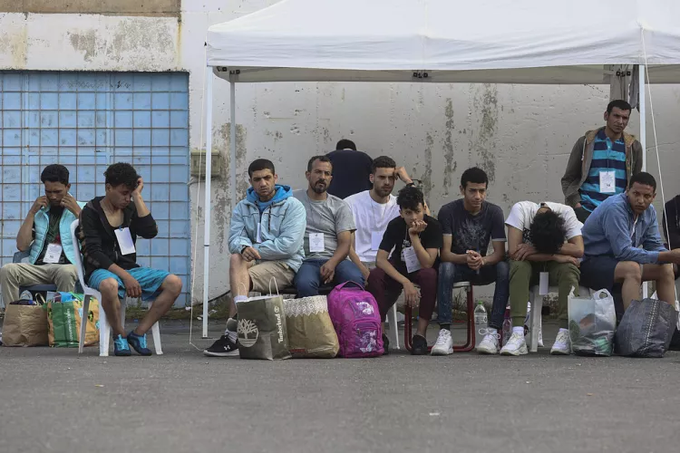 PHOTO: Survivors of the recent tragic shipwreck wait to board a bus to take them to Athens in the port of Kalamata, Greece, Friday, June 16, 2023 John Liakos / AP
