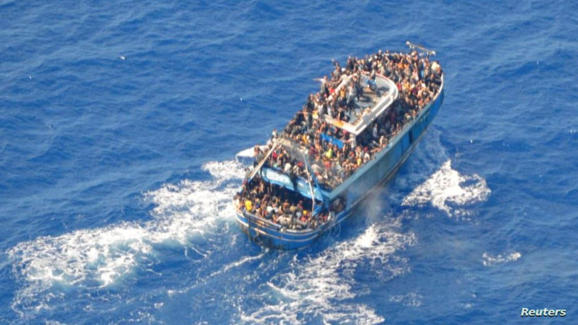 A undated handout photo provided by the Hellenic Coast Guard shows migrants onboard a boat during a rescue operation, before their boat capsized on the open sea, off Greece, June 14, 2023. Hellenic Coast Guard/Handout via REUTERS.